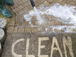 high pressure washing grease removal. Pressure washing parking lot grease stain removal. 